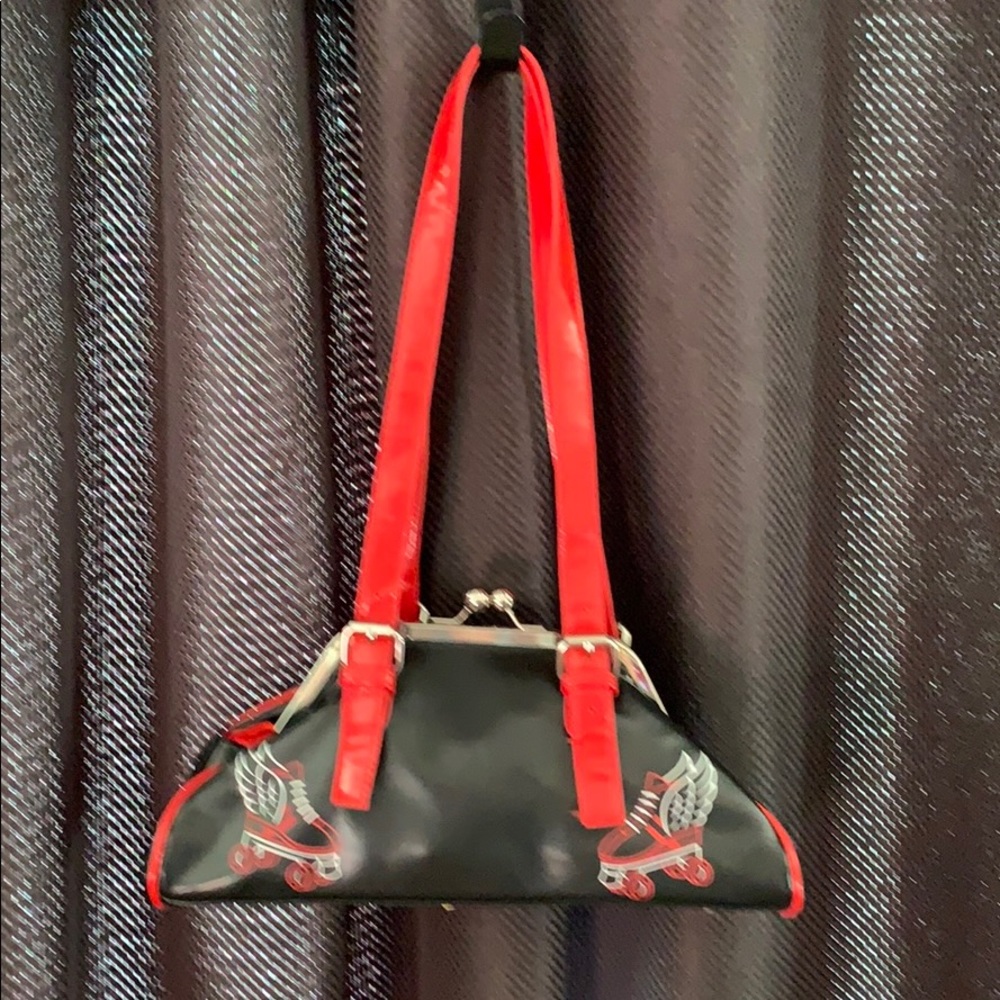 Sourpuss roller skate purse